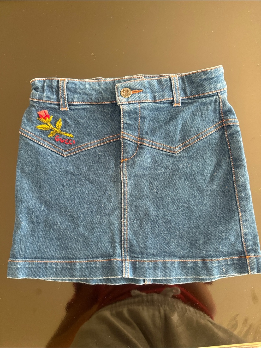 Gucci Denim Mini Skirt with Embroidered Rose Accent